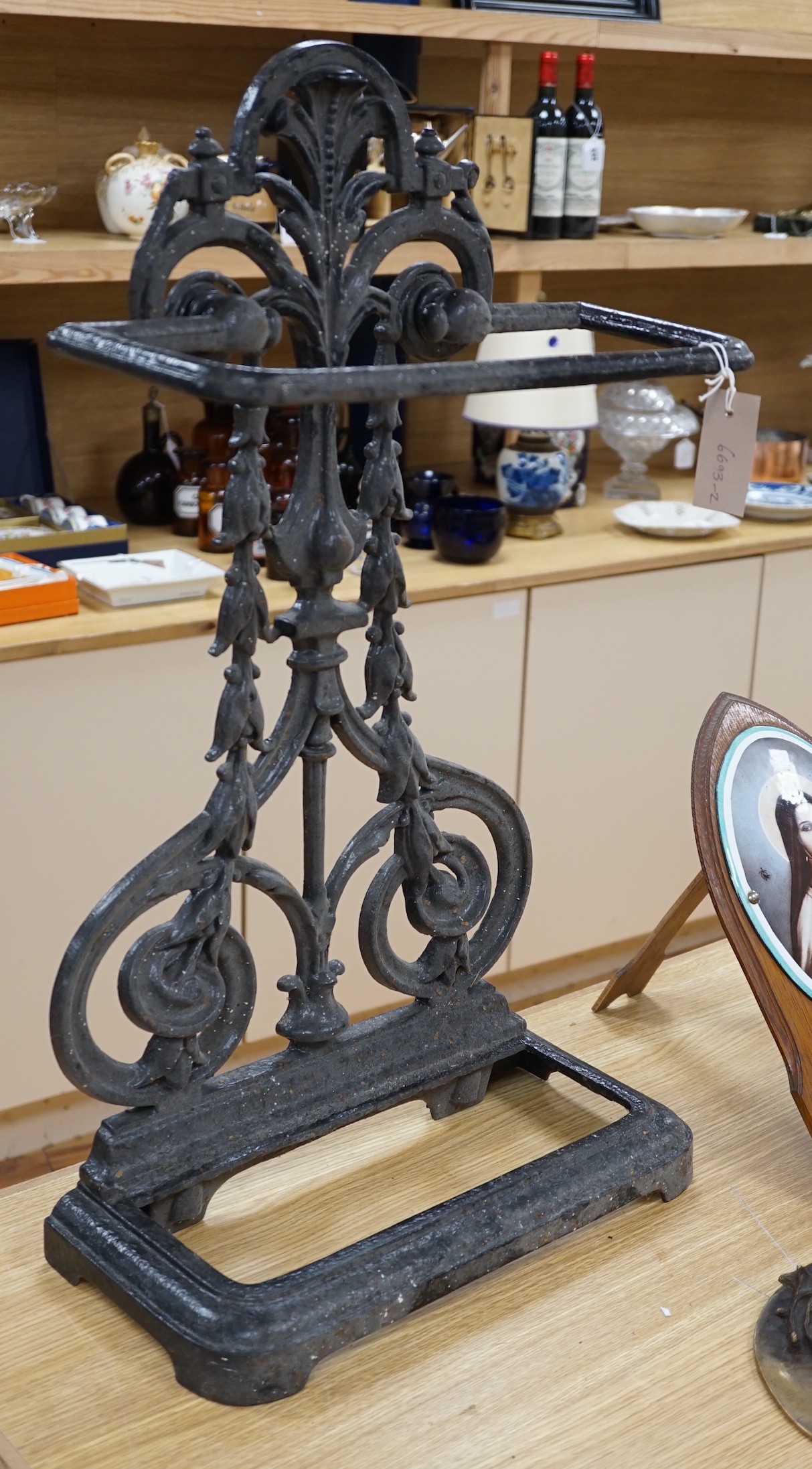 A Victorian cast iron umbrella stand, lacking tray to base, 72.5 cms high